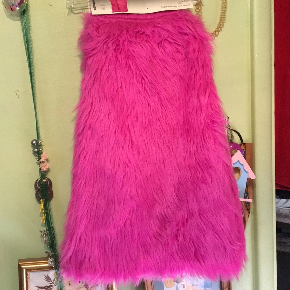Bright pink fuzzy knee high boot covers